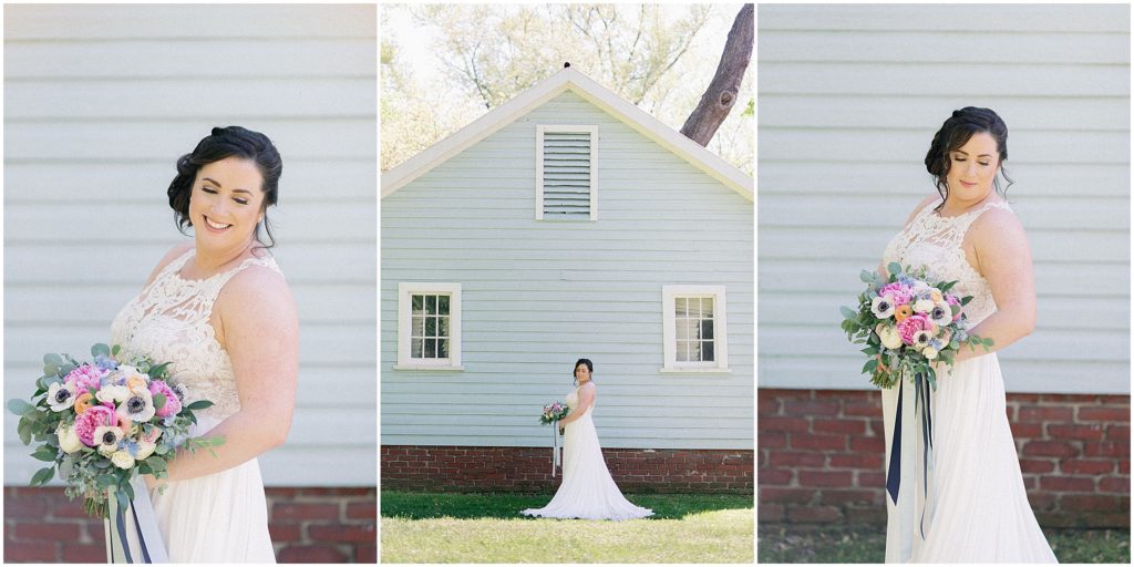 bridal portraits in front of blue barn