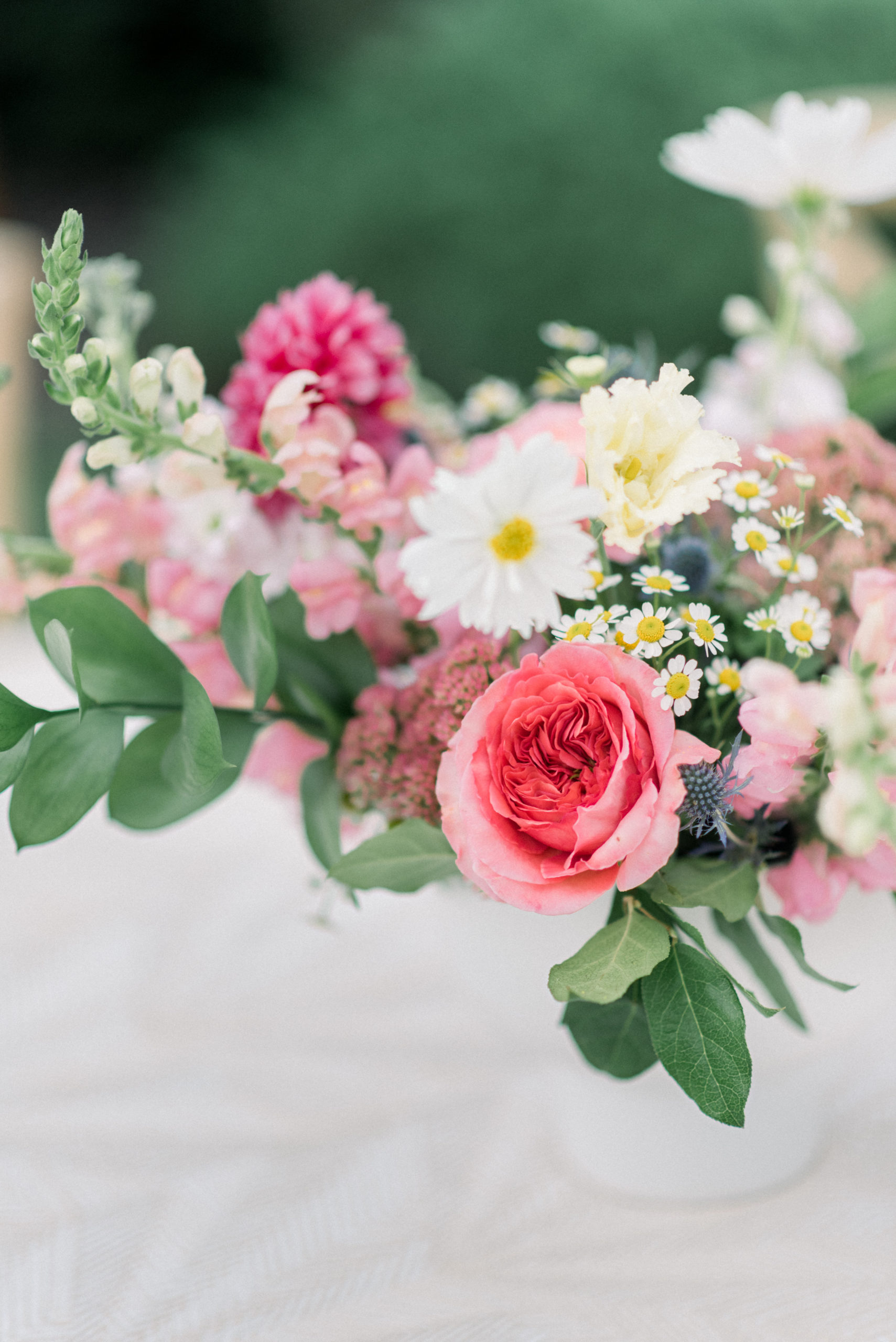 close up of wedding florals at outdoor reception