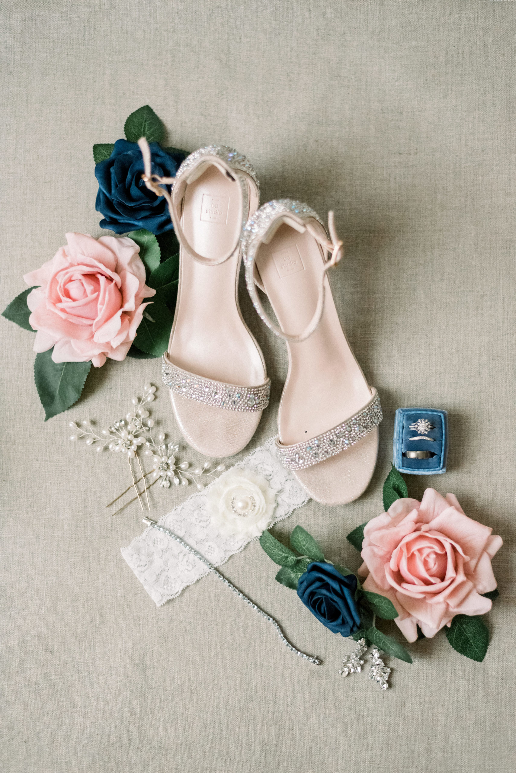 bridal details from stunning lodges at gettysburg wedding with sparkly shoes, pink flowers and perfume