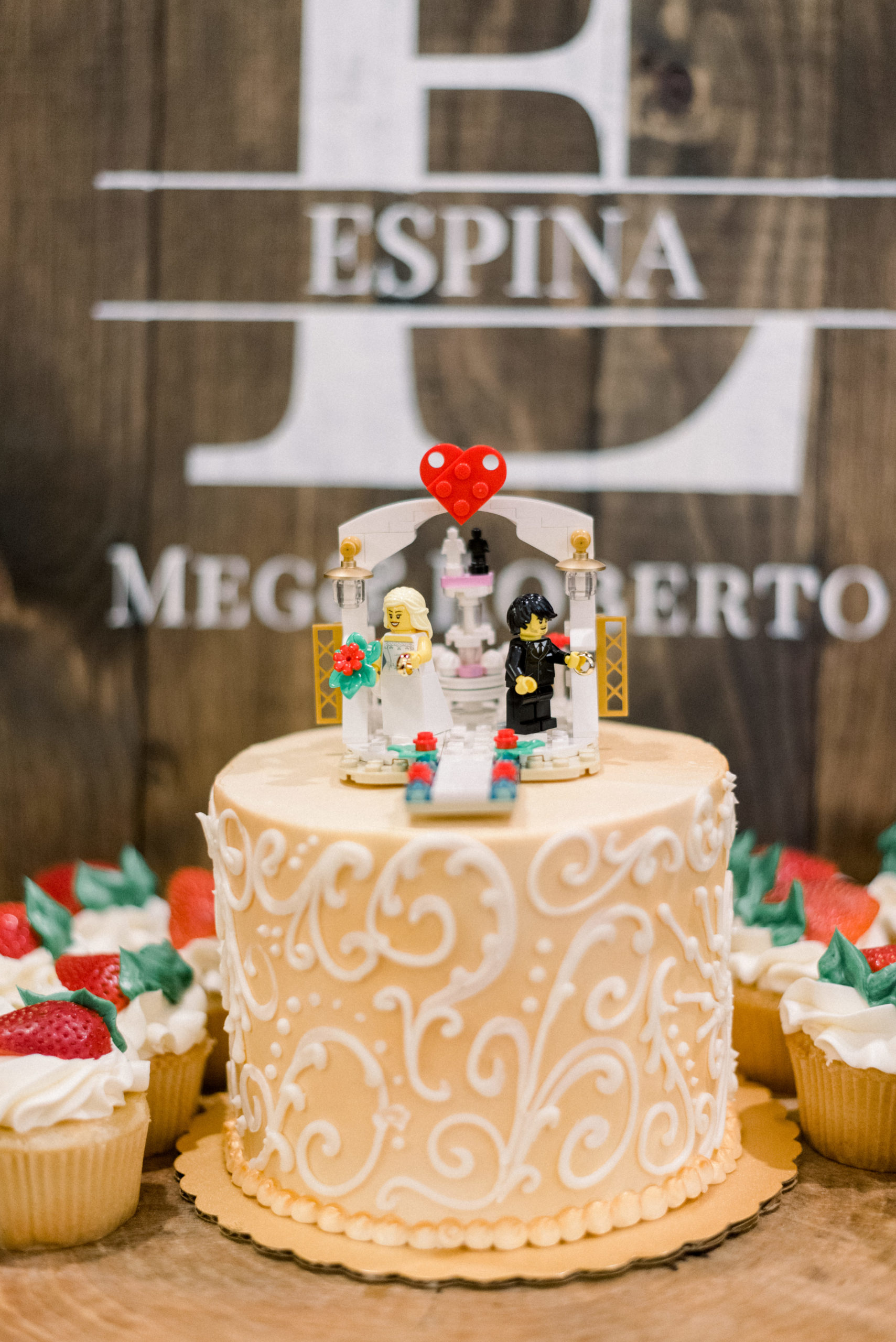 single tier cake with lego bride and groom on top