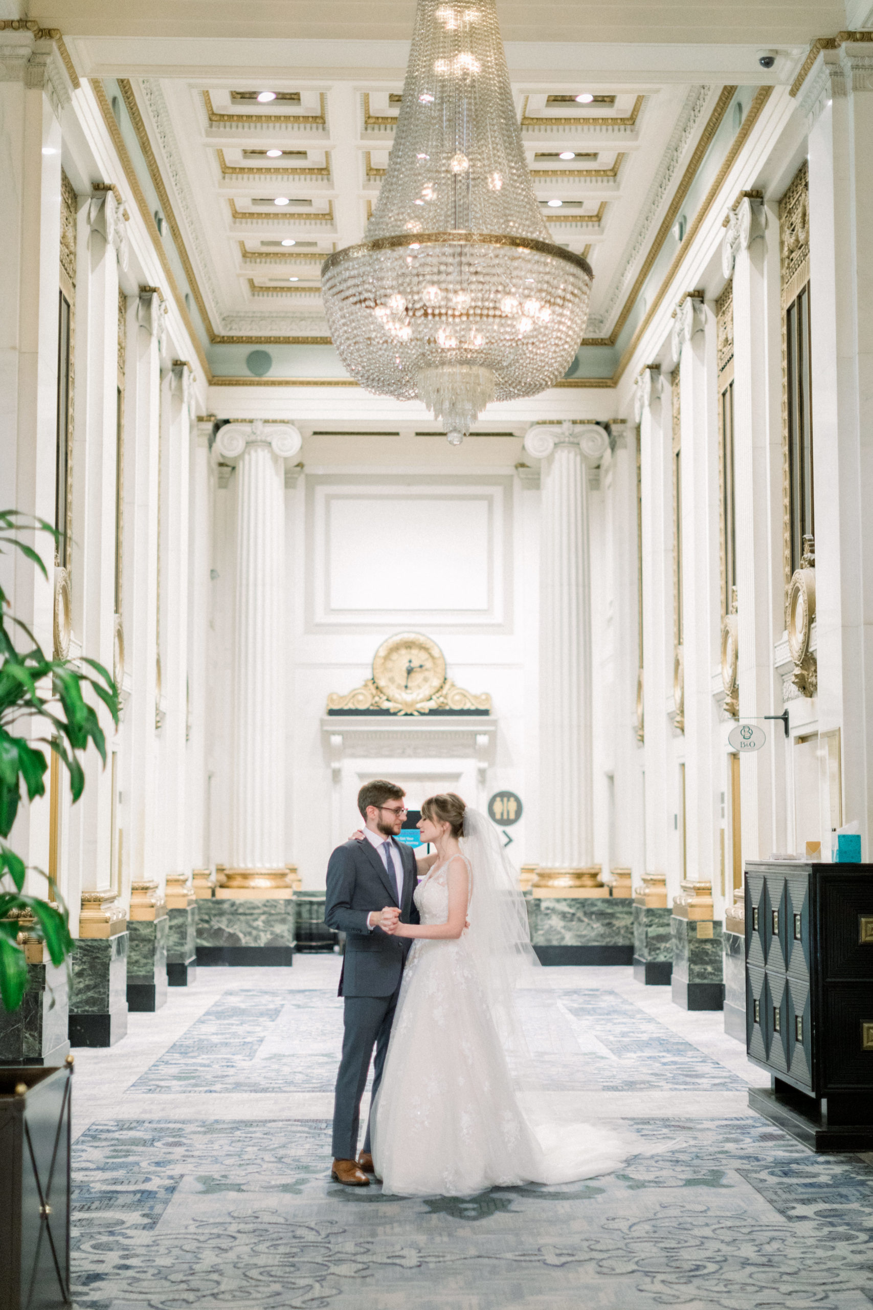 bride and groom standing together after elegantly Modern Accelerator Baltimore Wedding