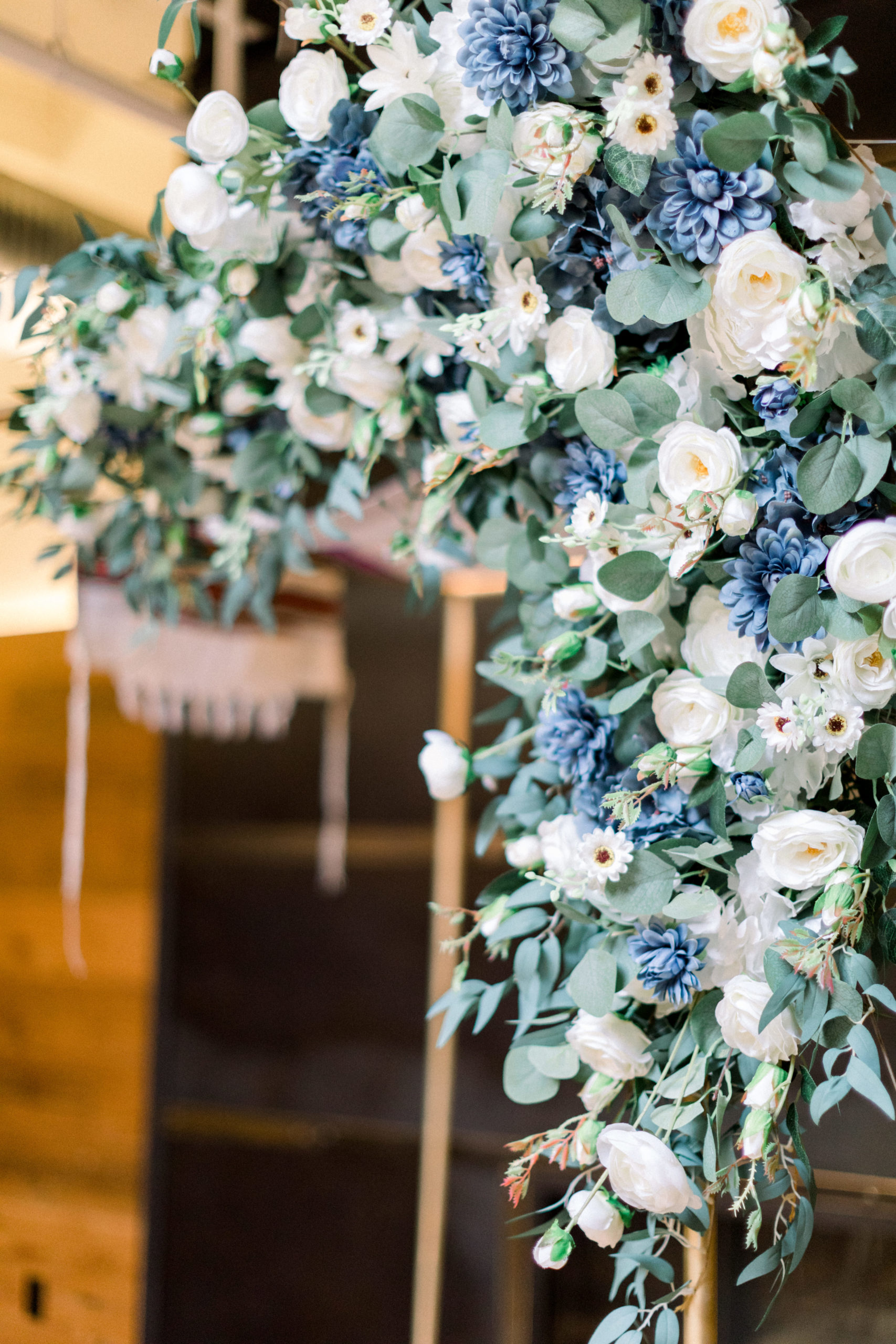 close up of wedding arch floral arrangement