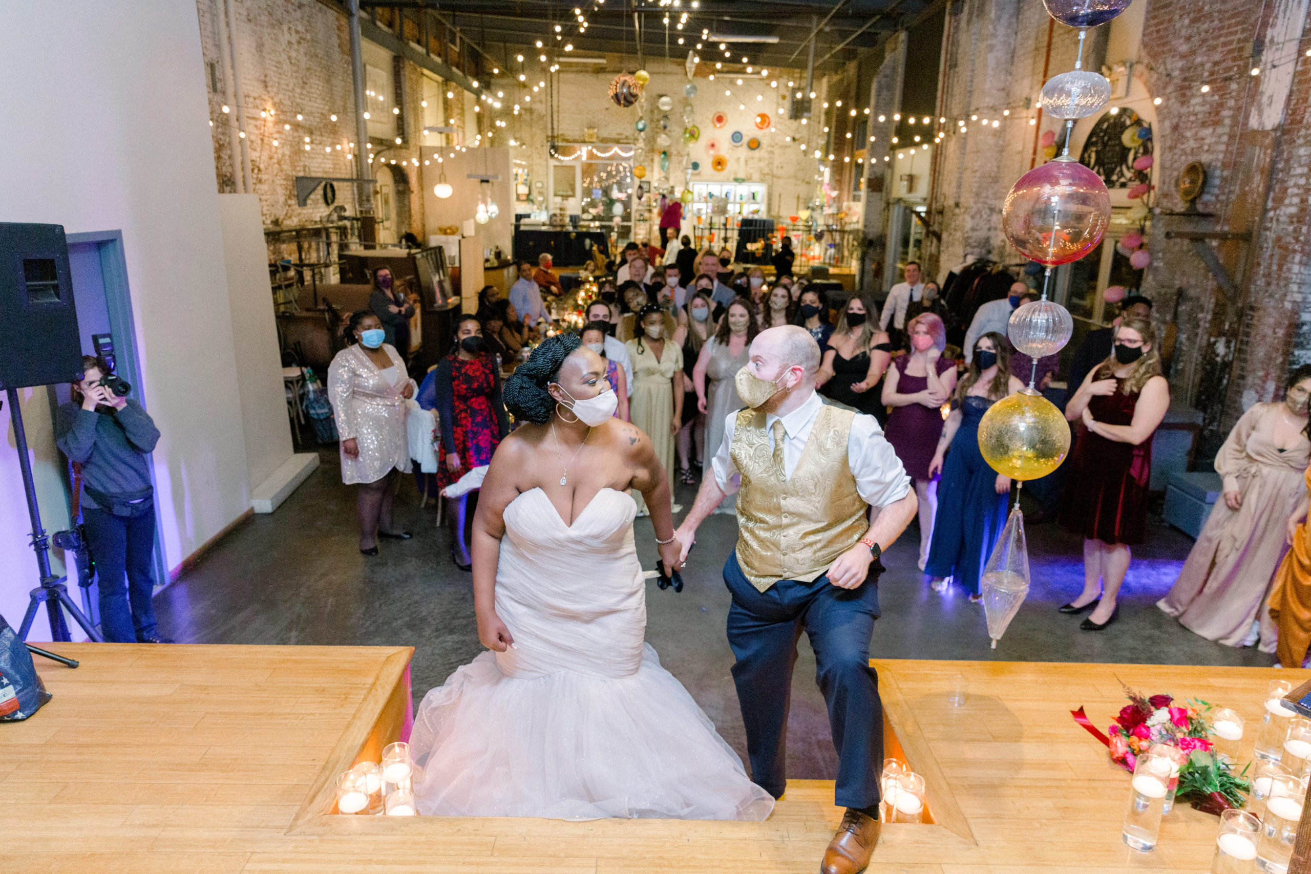 newly married couple throwing bouquet at Romantic Fall Baltimore Wedding reception