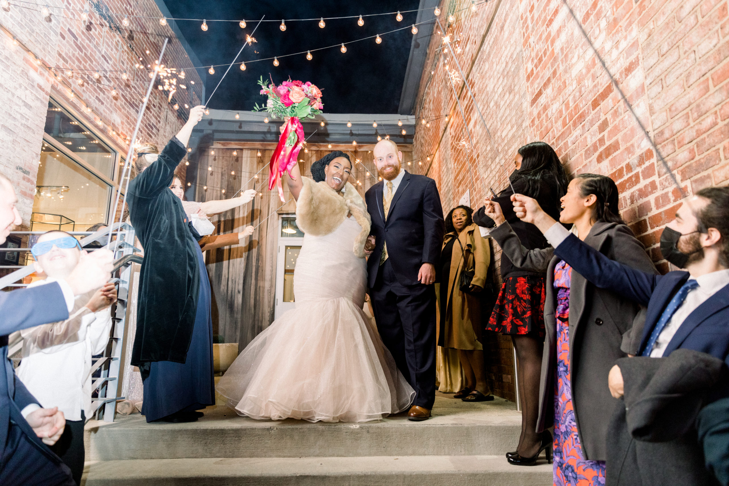 bride and groom exiting Romantic Fall Baltimore Wedding reception