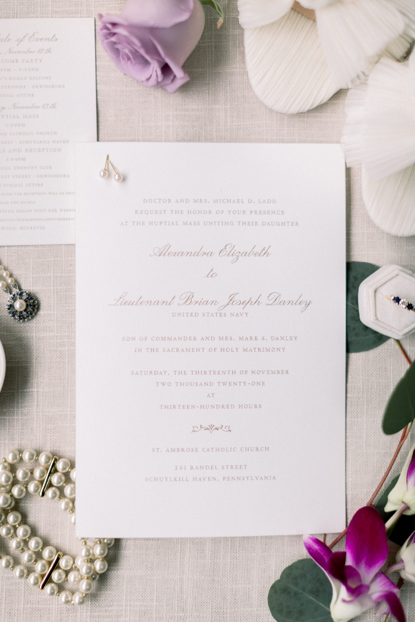 details picture of fall pennslyvania wedding with invitation and jewlery