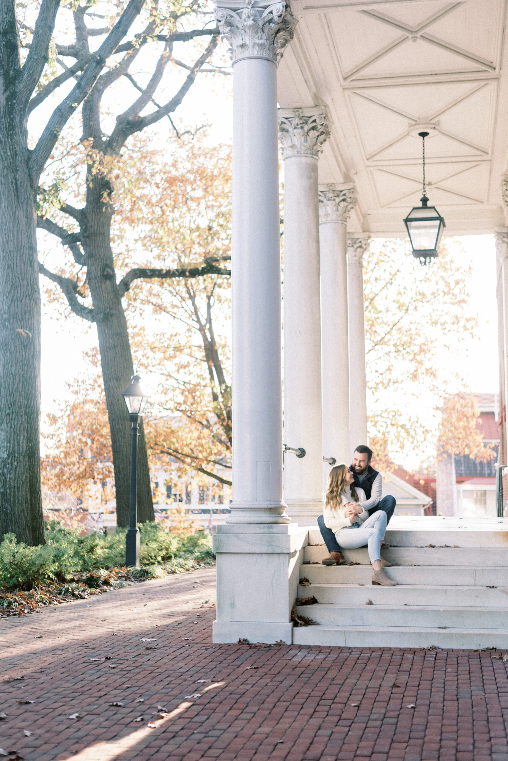 Maryland wedding photographer captures couple sitting together on porch