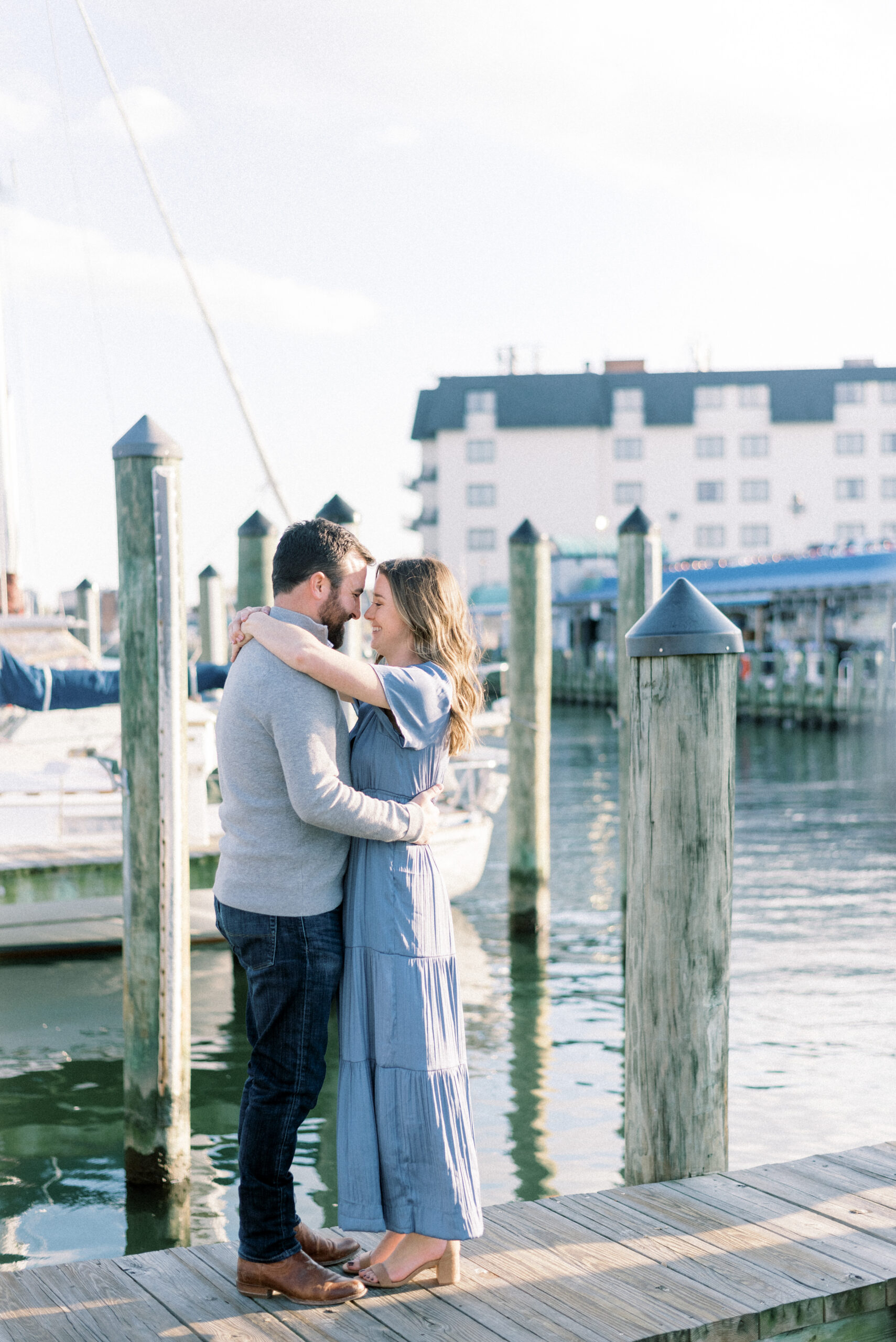 Maryland wedding photographer captures man and woman hugging on dock
