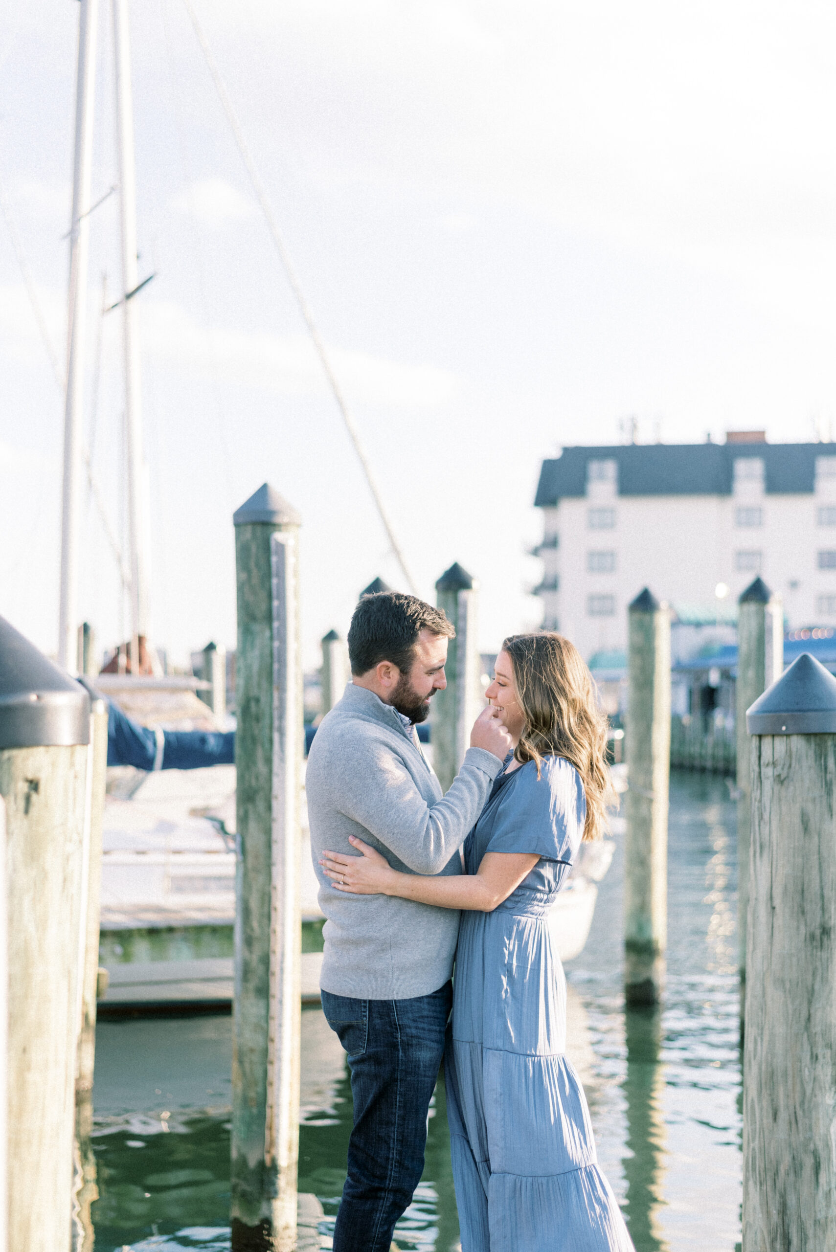 Maryland wedding photographer captures couple dancing together on dock