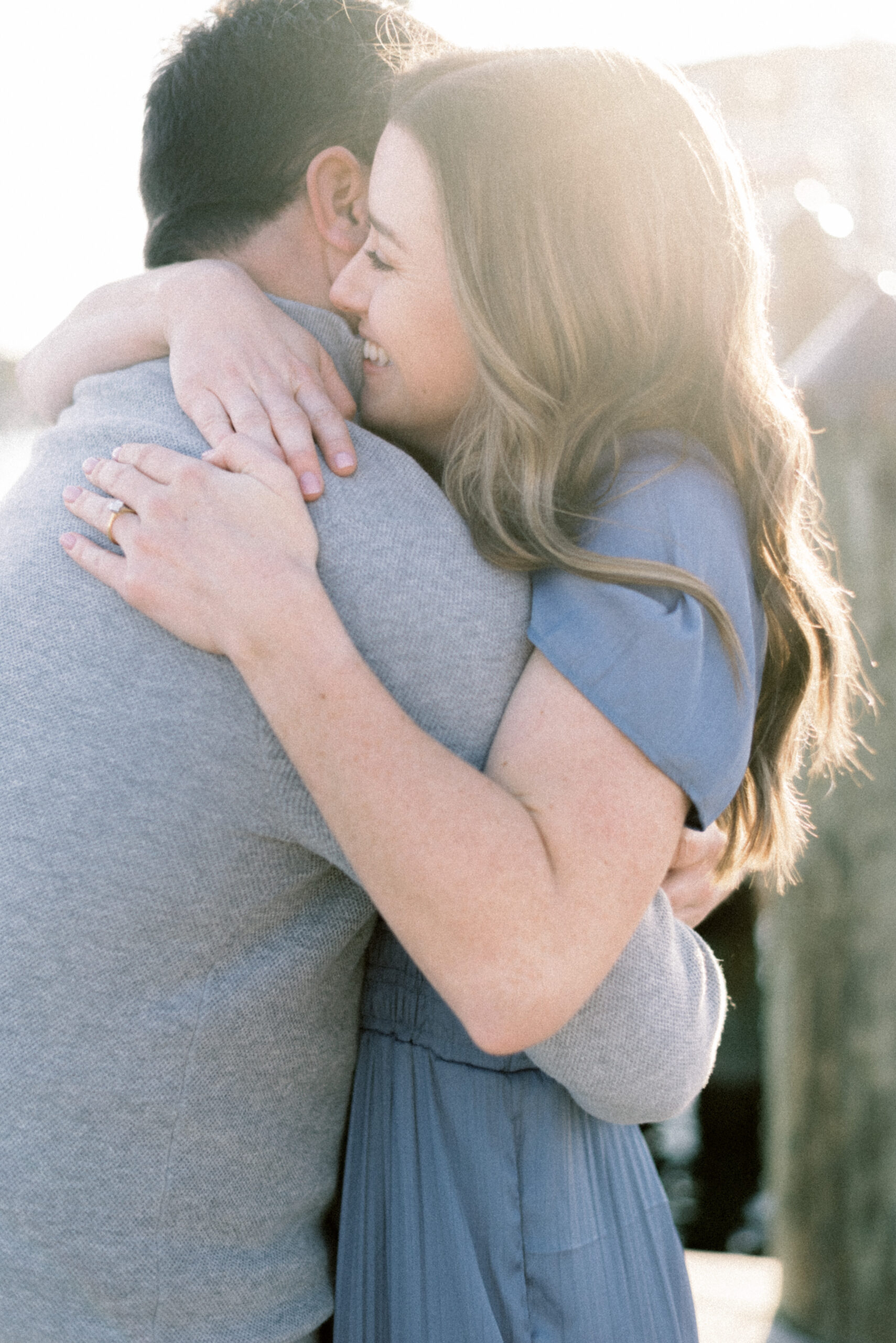 Maryland wedding photographer captures woman hugging man