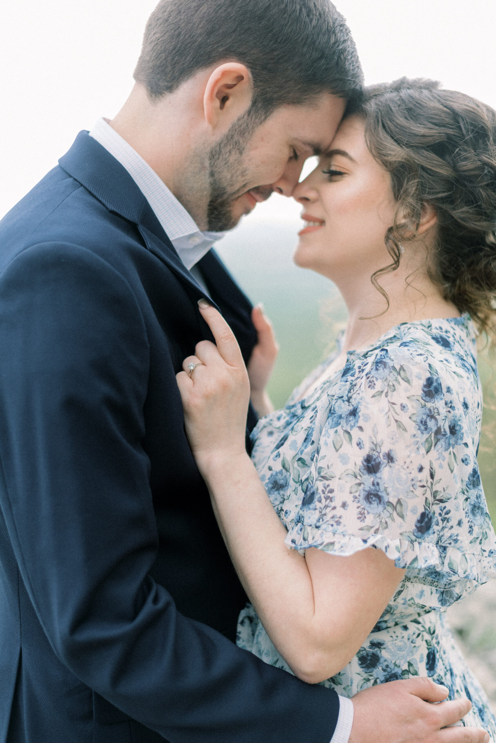 Maryland wedding photographer captures couple hugging with noses touching
