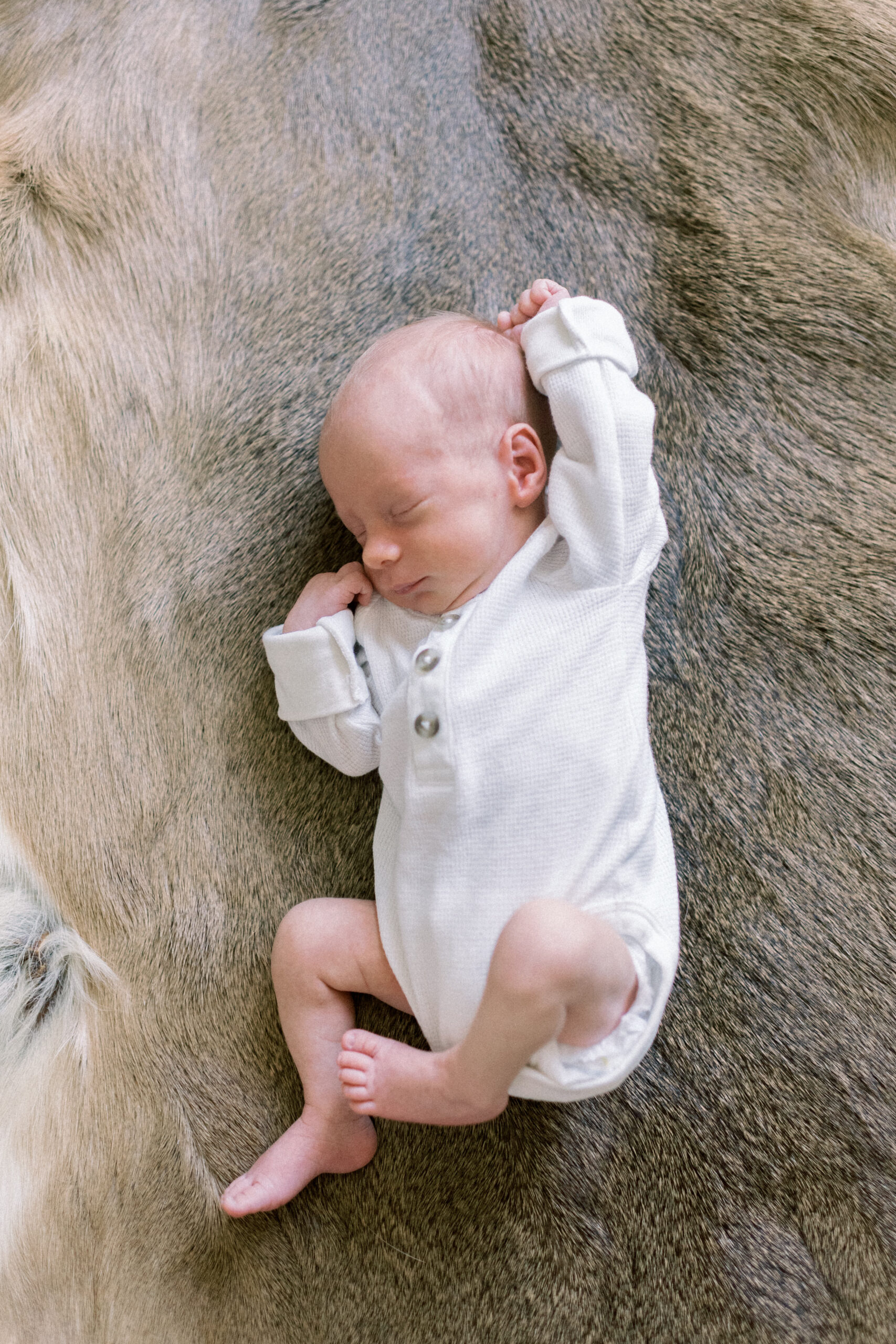 Pennsylvania photographer captures baby sleeping with arm above head
