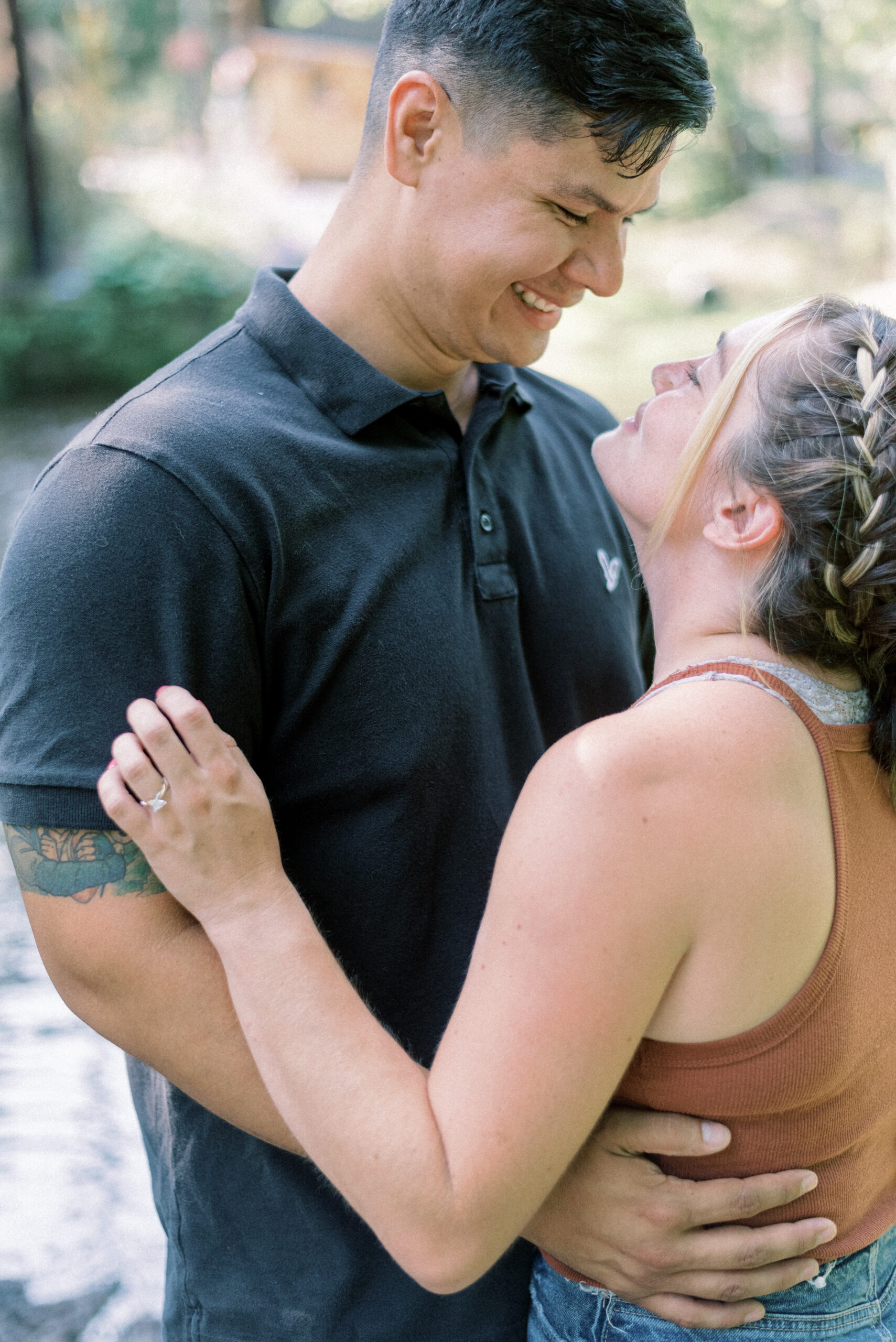 Maryland photographer captures couple hugging and celebrating knoebels proposal
