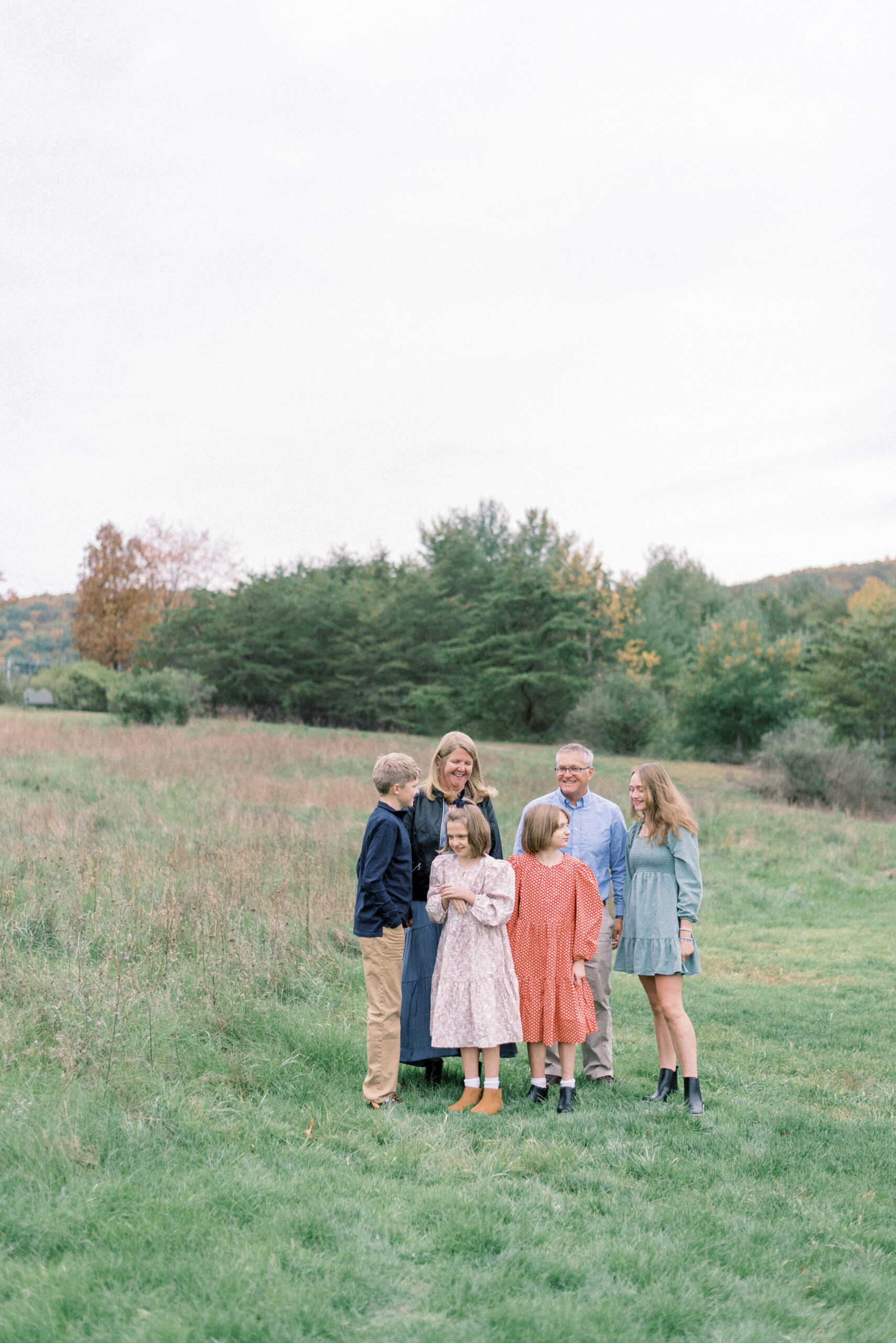 Pennsylvania photographer captures family standing together and talking