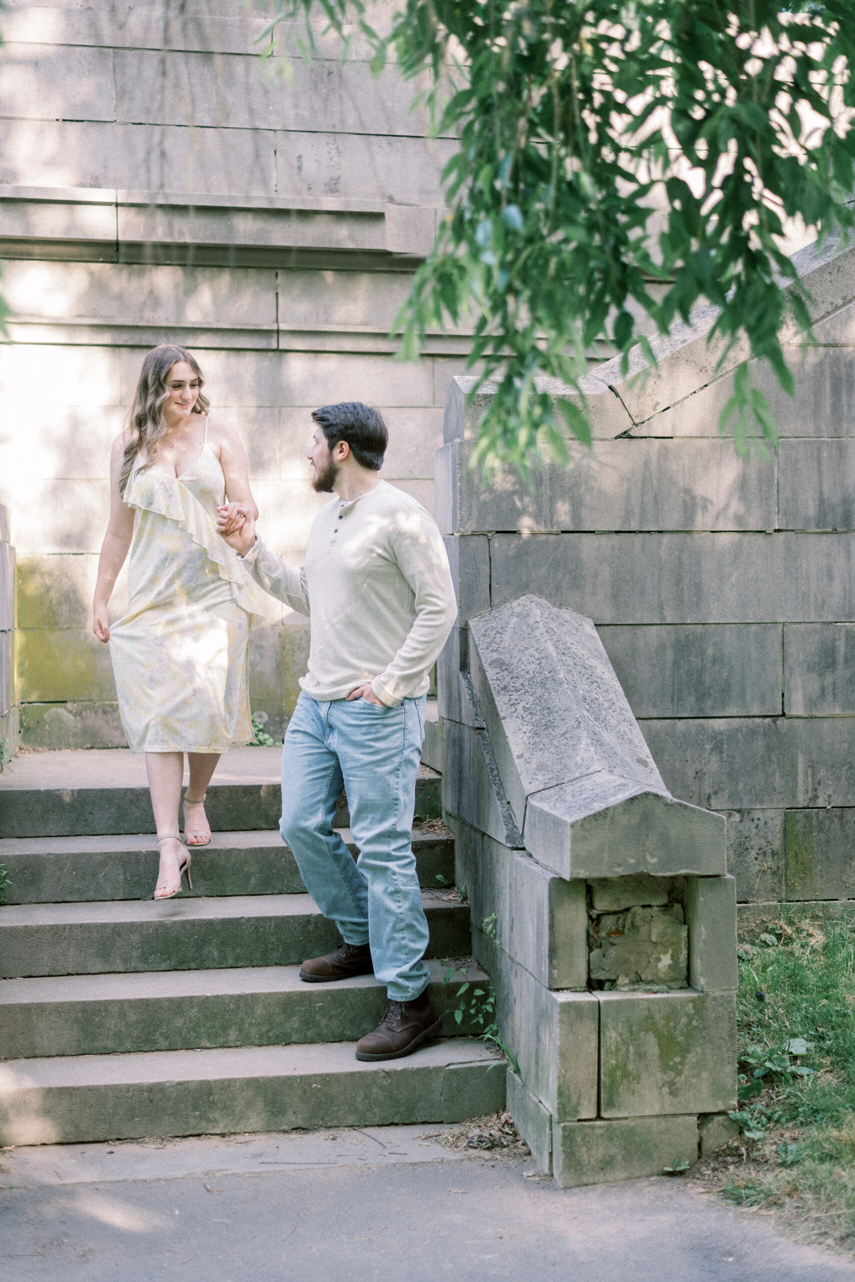 Maryland wedding photographer captures man leading woman downstairs