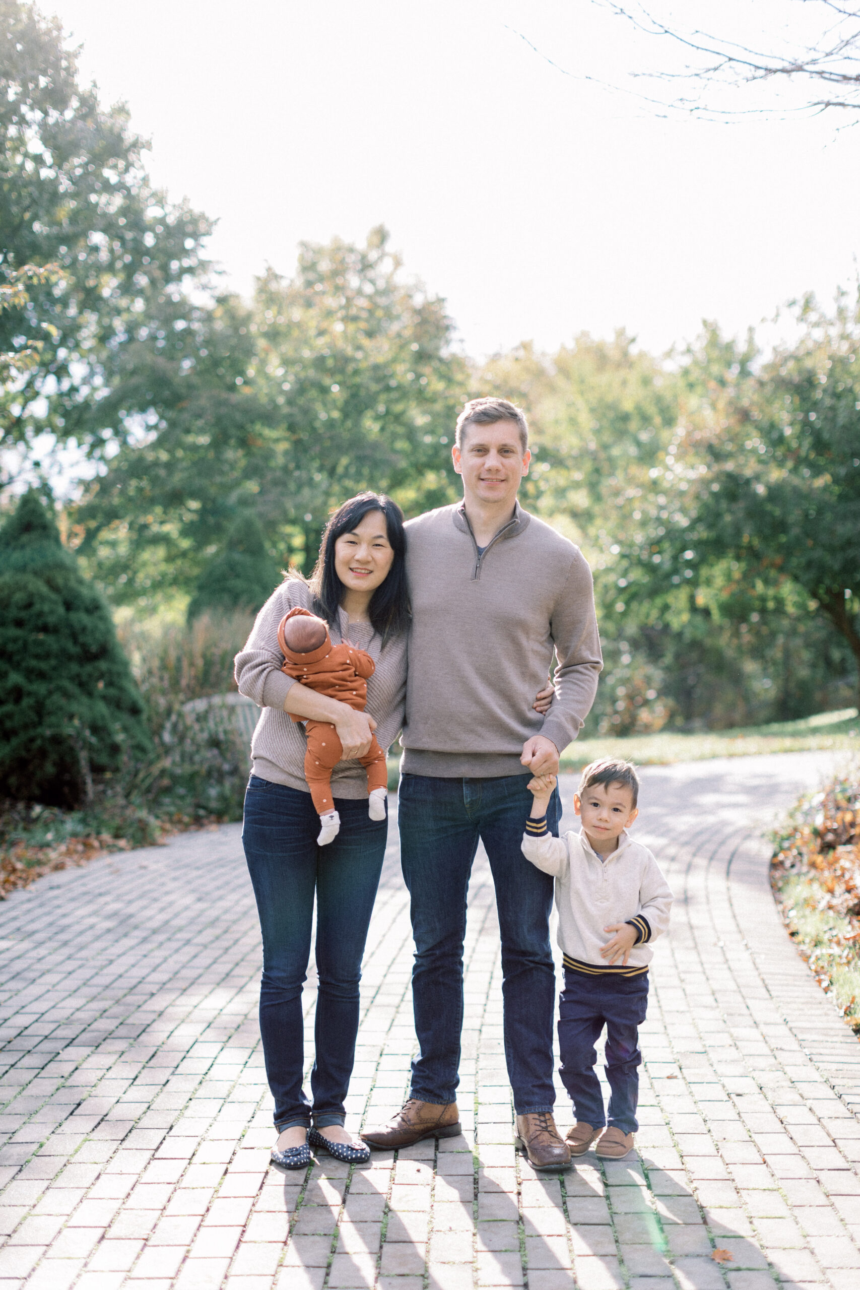Maryland photographer captures young family standing together at Howard Conservancy