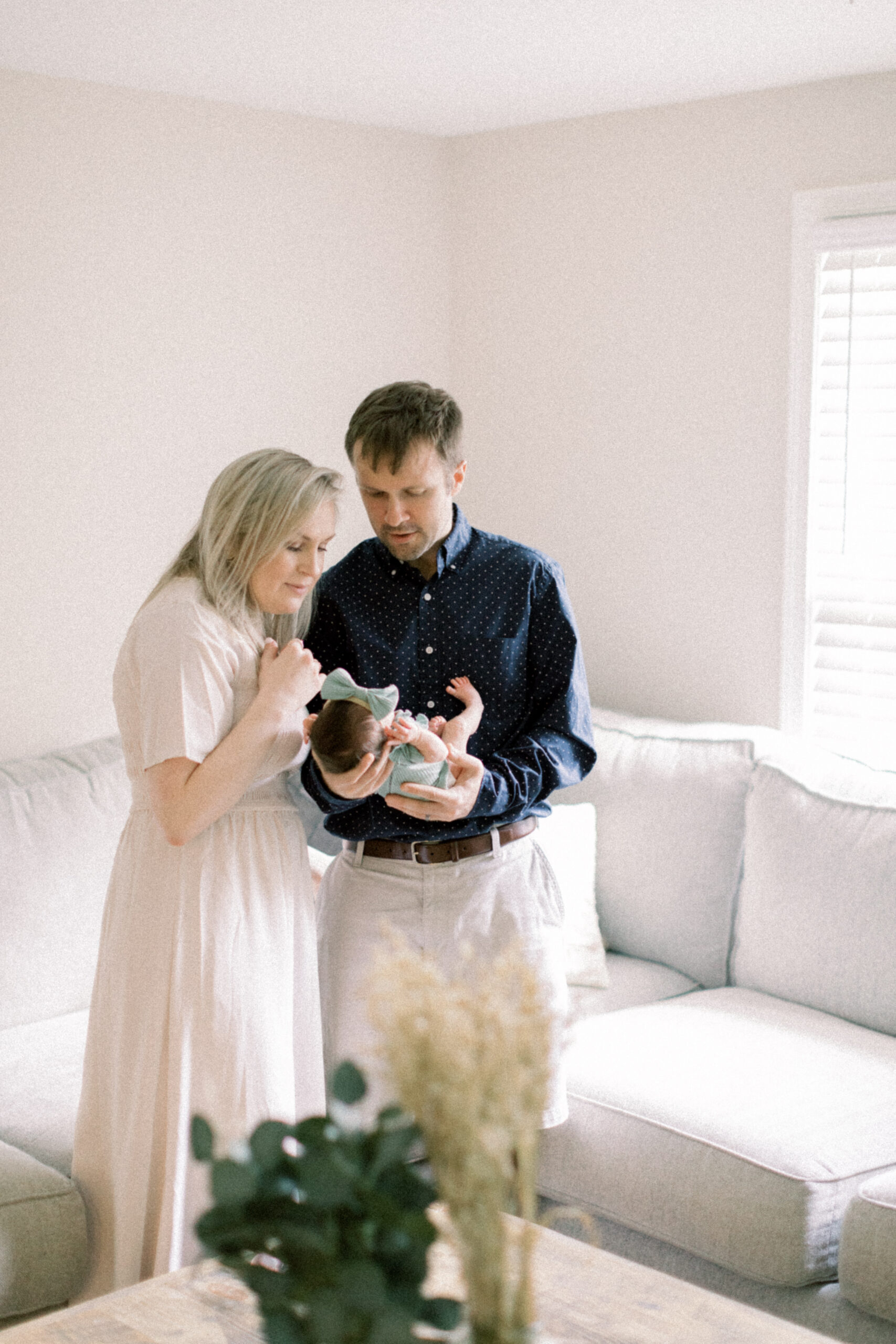 Maryland photographer captures couple looking at daughter