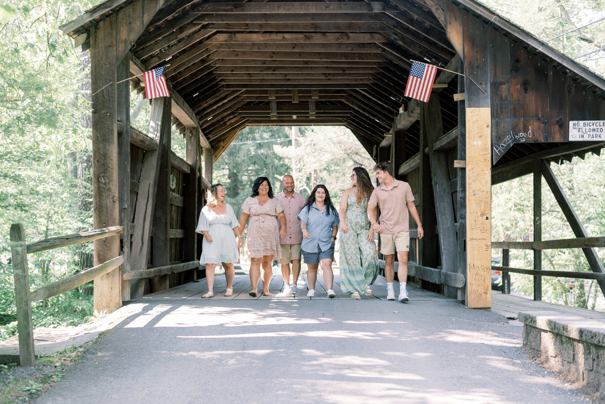 Maryland wedding photographer captures family during Knoebels Family portraits in bridge
