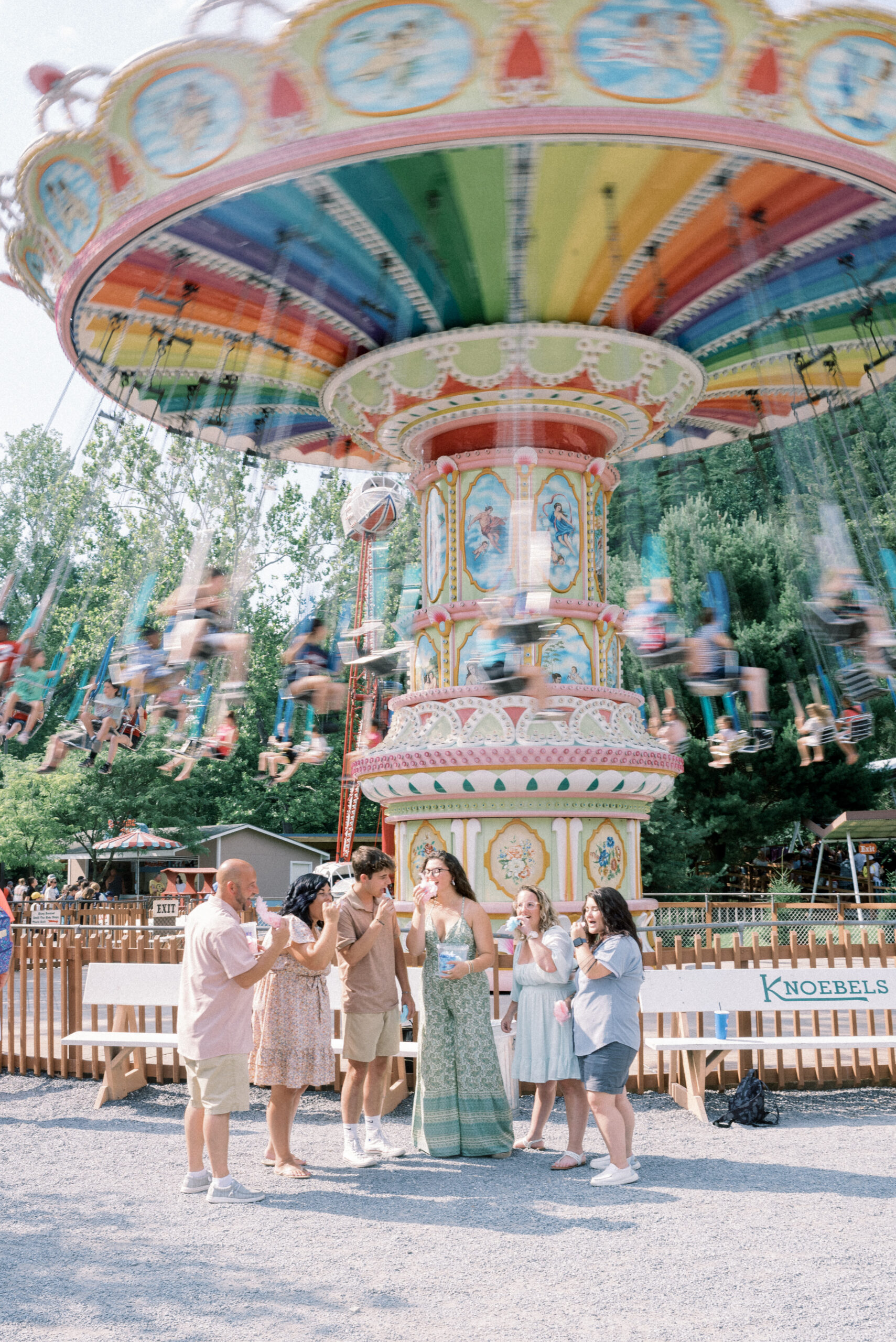 Maryland wedding photographer captures family in front of attraction at Knoebels