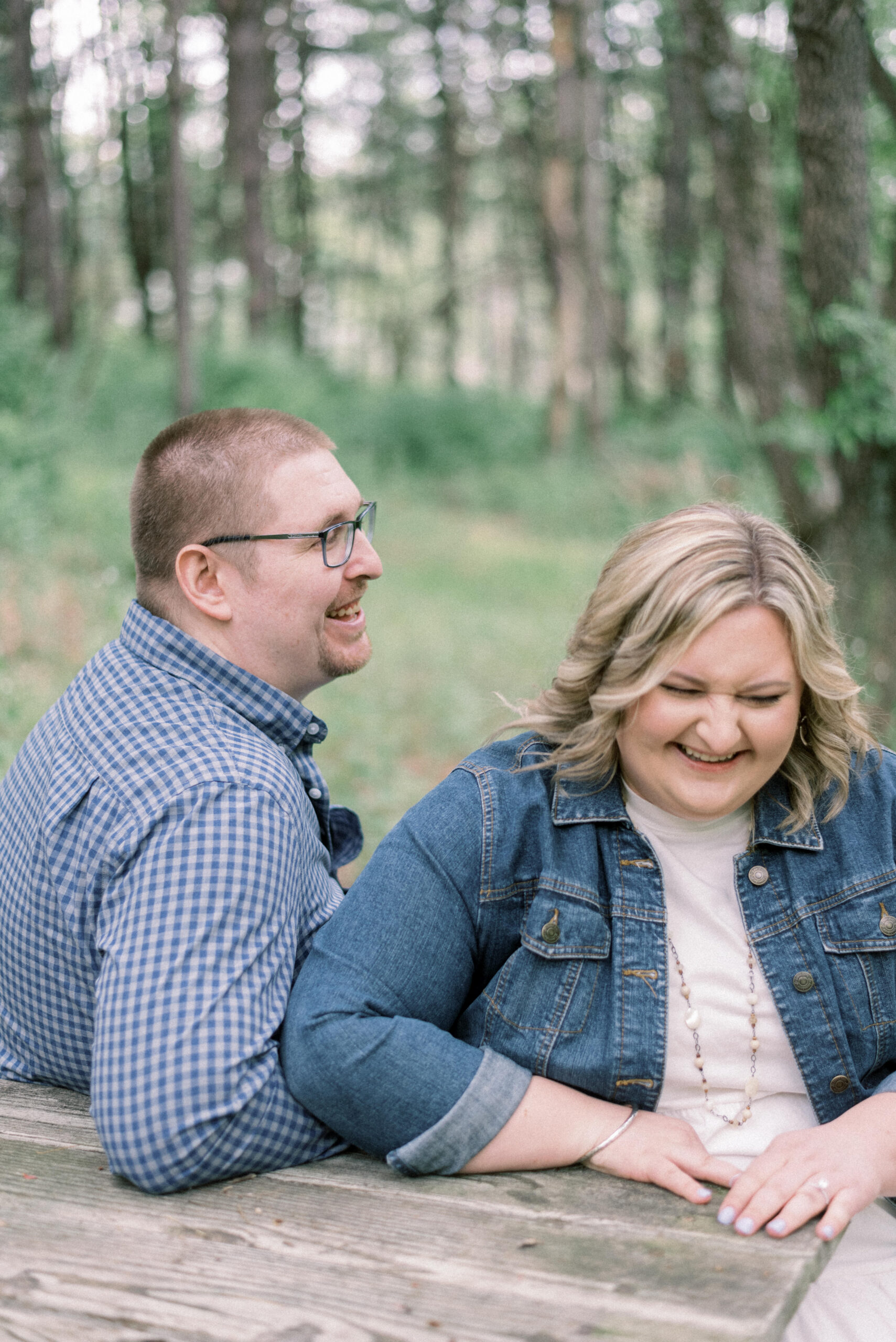 Pennsylvania wedding photographer captures man and woman laughing while sitting together