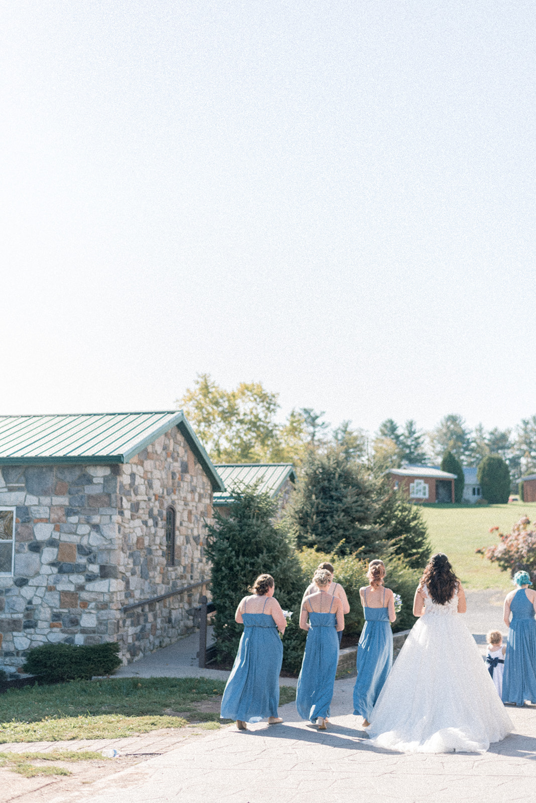 Pennsylvania wedding photographer captures bride and bridesmaids walking away