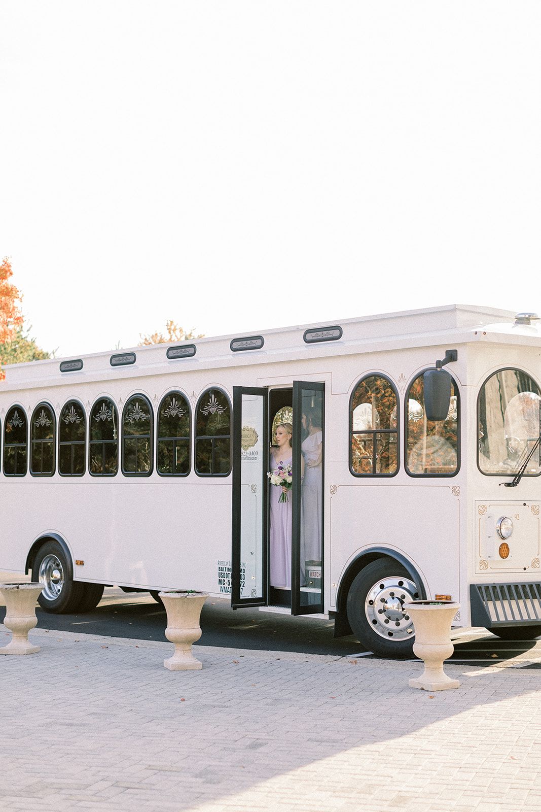 Pennsylvania wedding photographer captures white bus dropping off wedding party