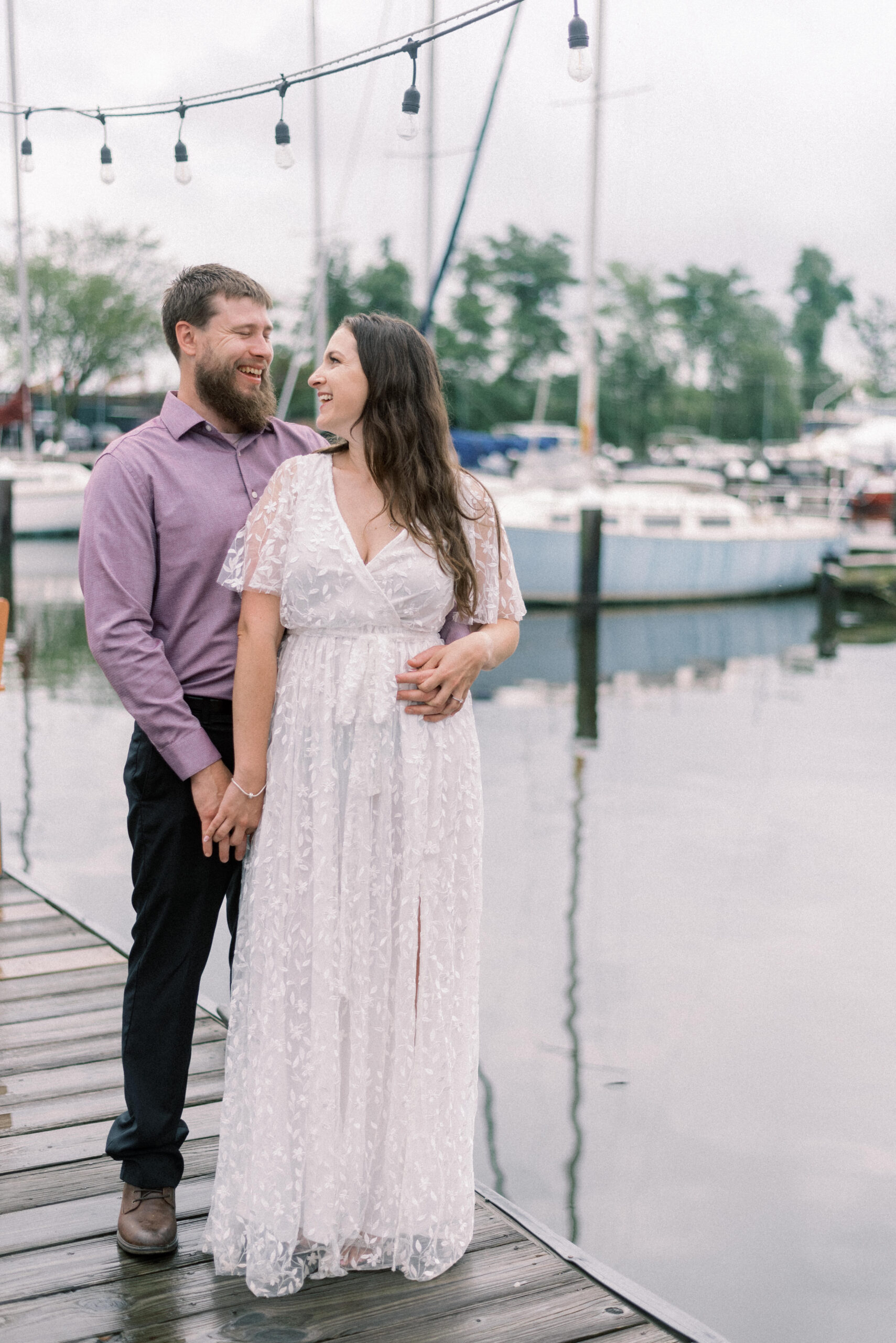 Pennsylvania wedding photographer captures couple smiling at dock