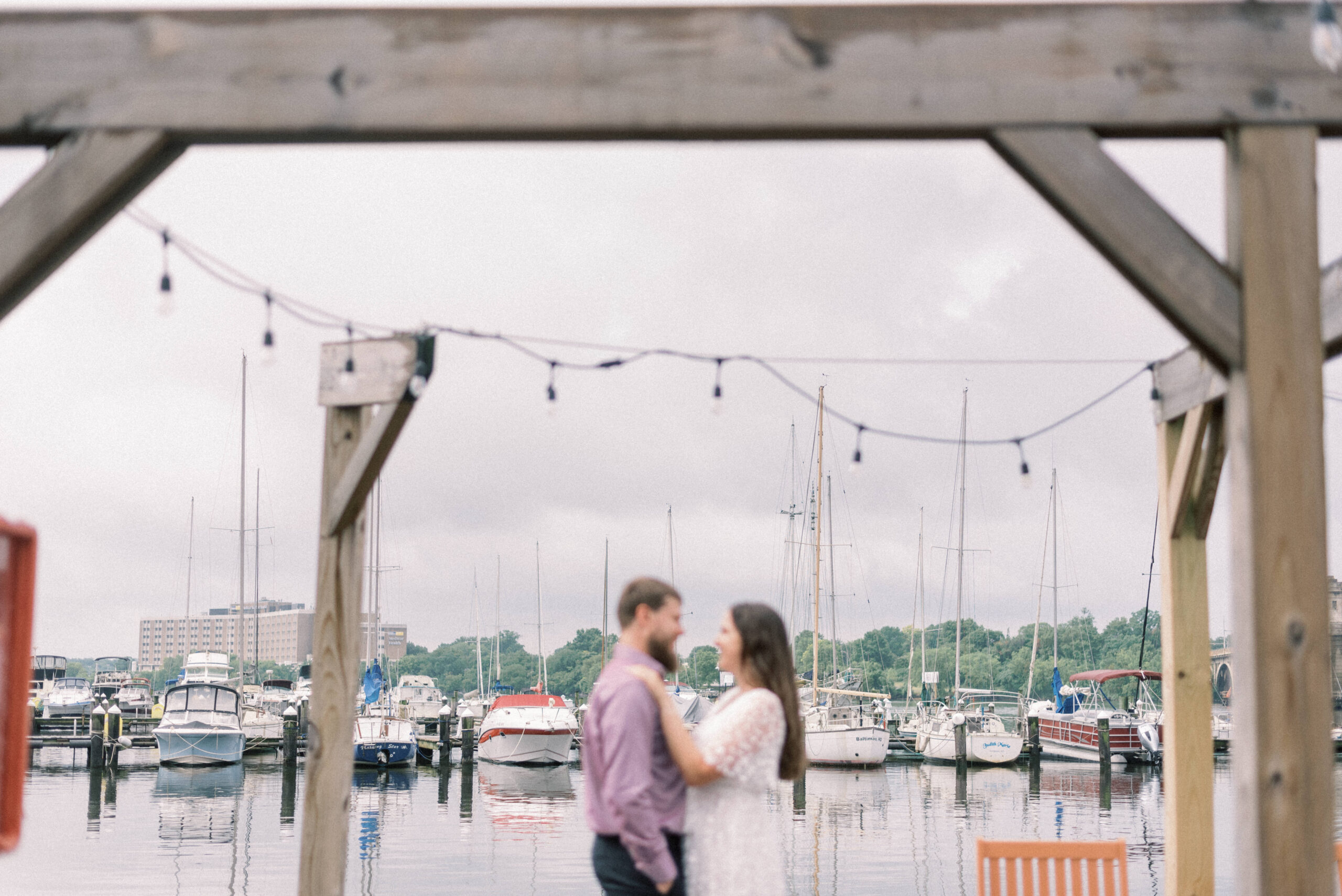Pennsylvania wedding photographer captures couple hugging at dock