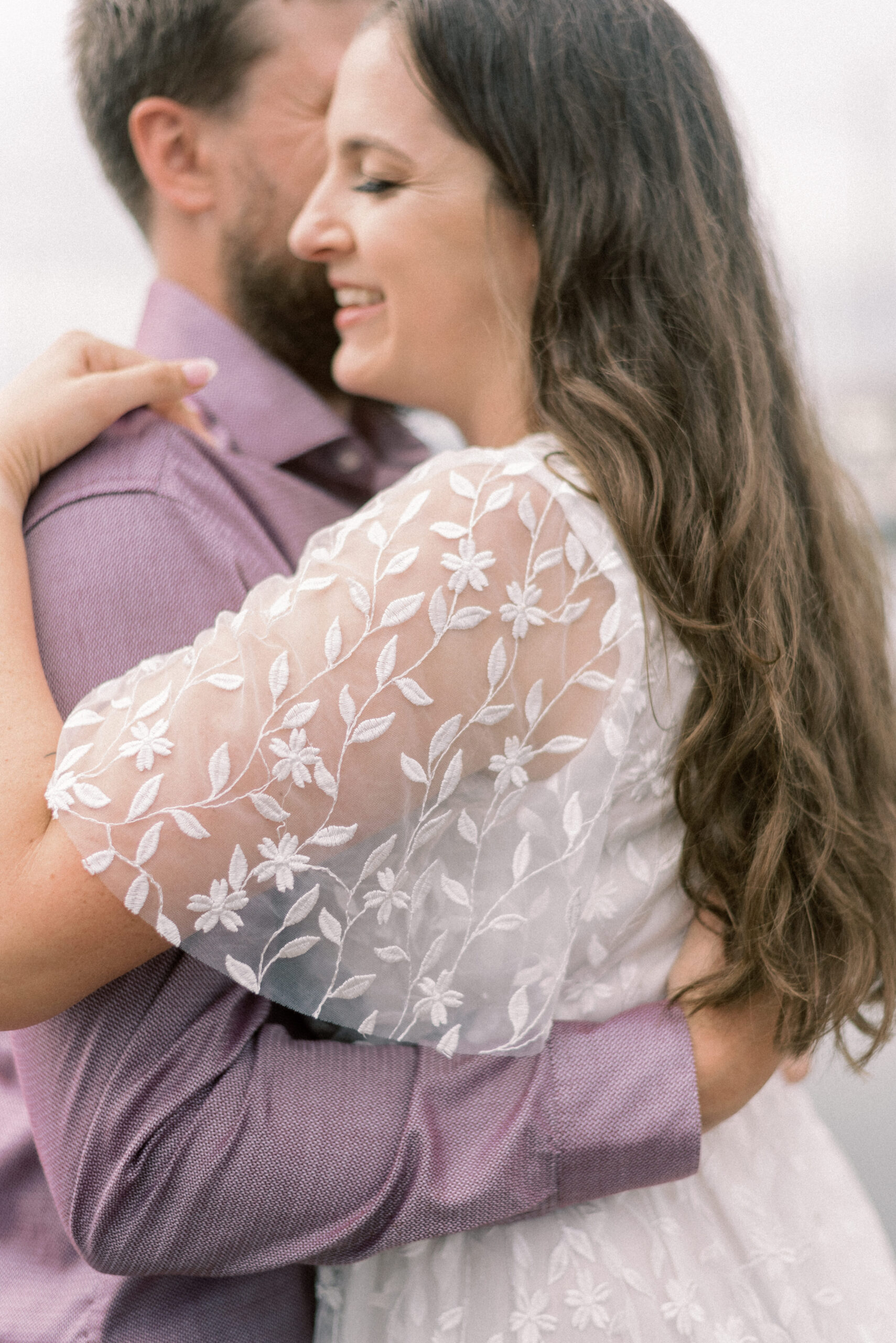 Pennsylvania wedding photographer captures woman wearing white dress during engagement photos