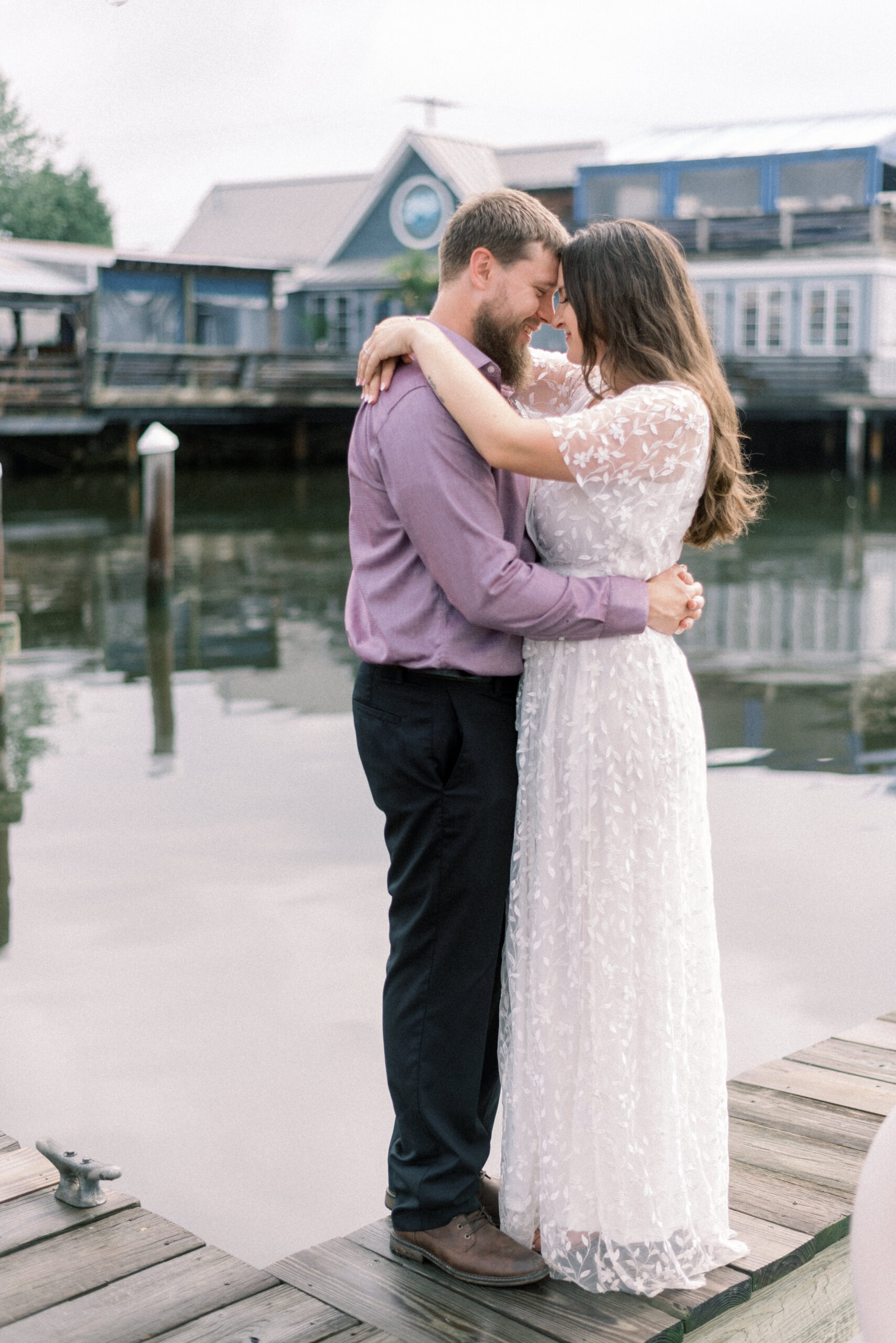 Pennsylvania wedding photographer captures couple dancing on dock together