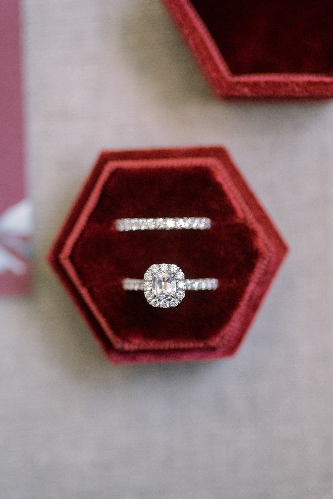 Pennsylvania wedding photographer captures red ring box with ring sitting inside