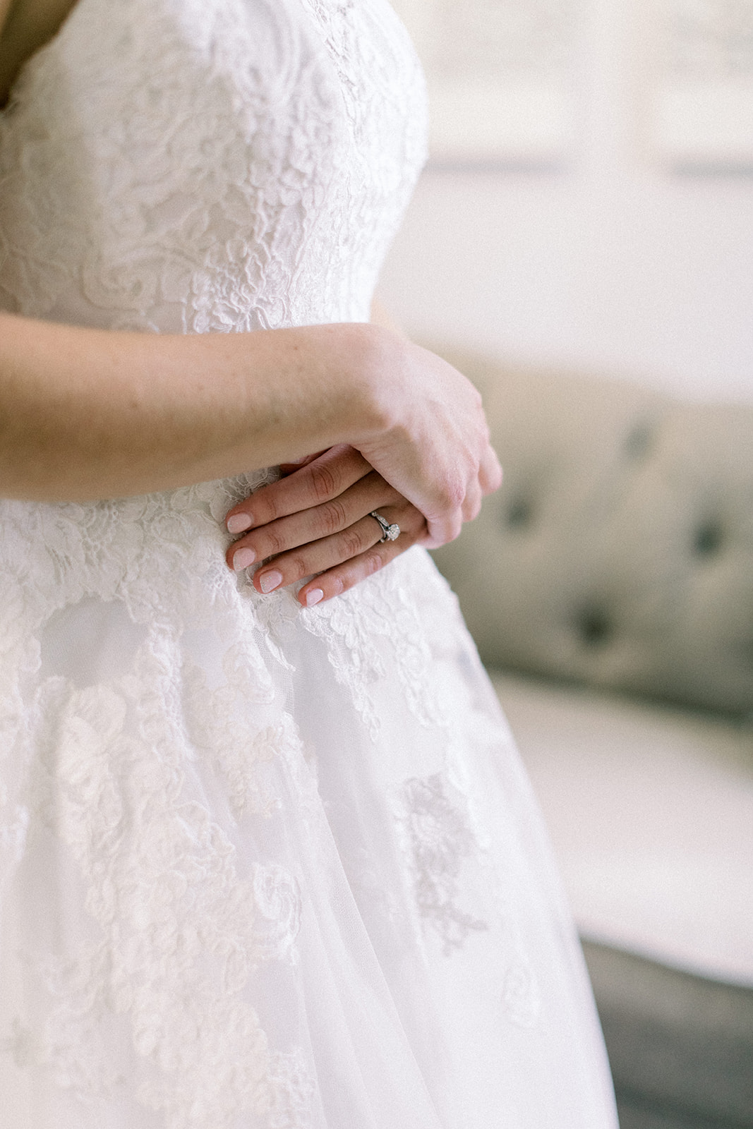 Pennsylvania wedding photographer captures bride crossing hands over wedding dress