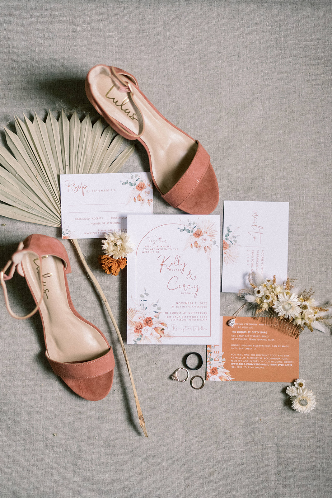 Pennsylvania wedding photographer captures boho inspired wedding details with wedding invitations and rust colored shoes