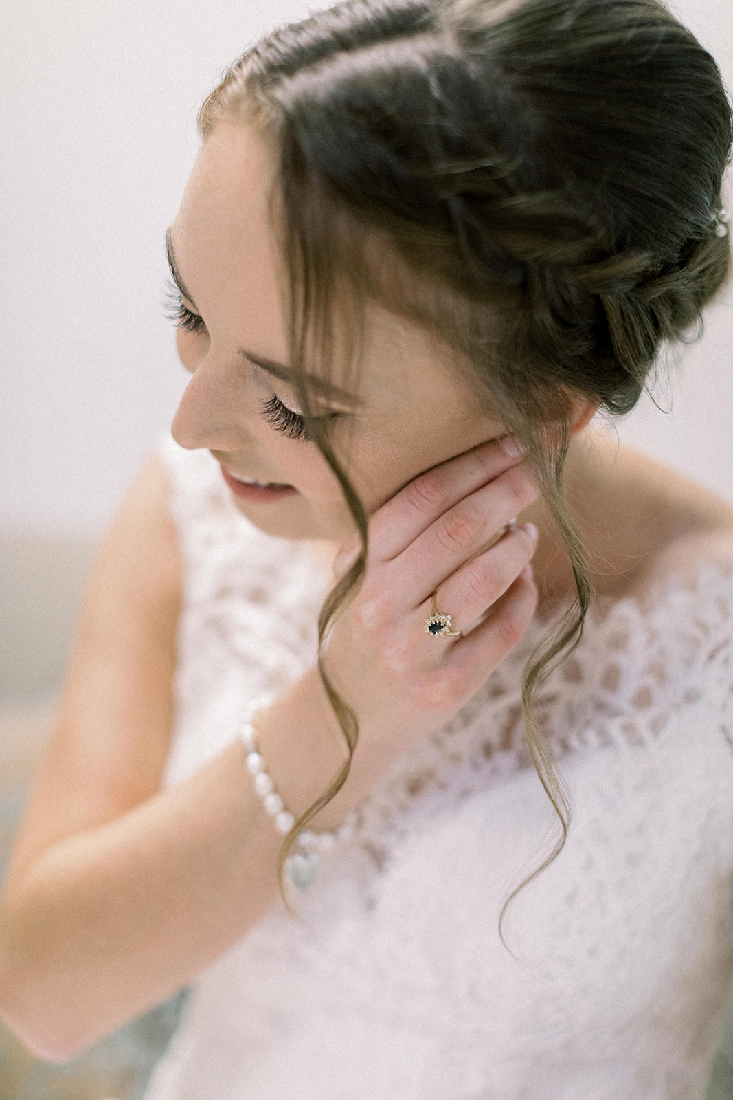 Pennsylvania wedding photographer captures bride putting earrings on