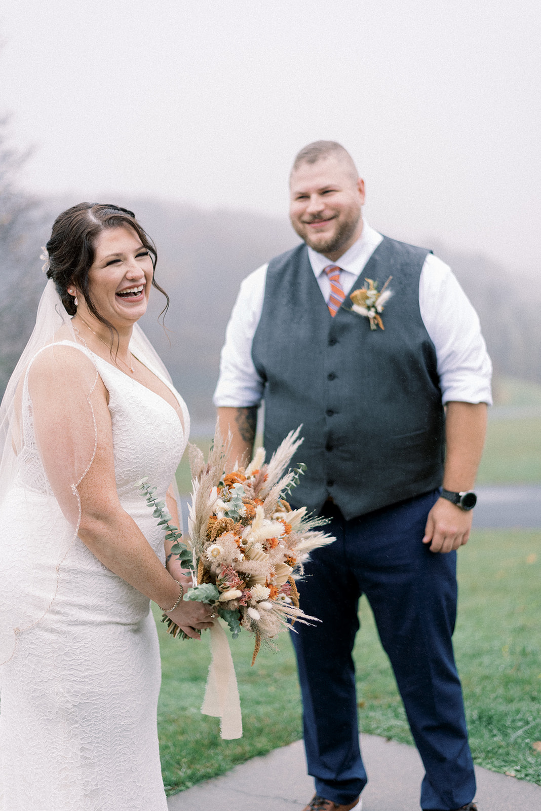 Pennsylvania wedding photographer captures bride laughing after first look
