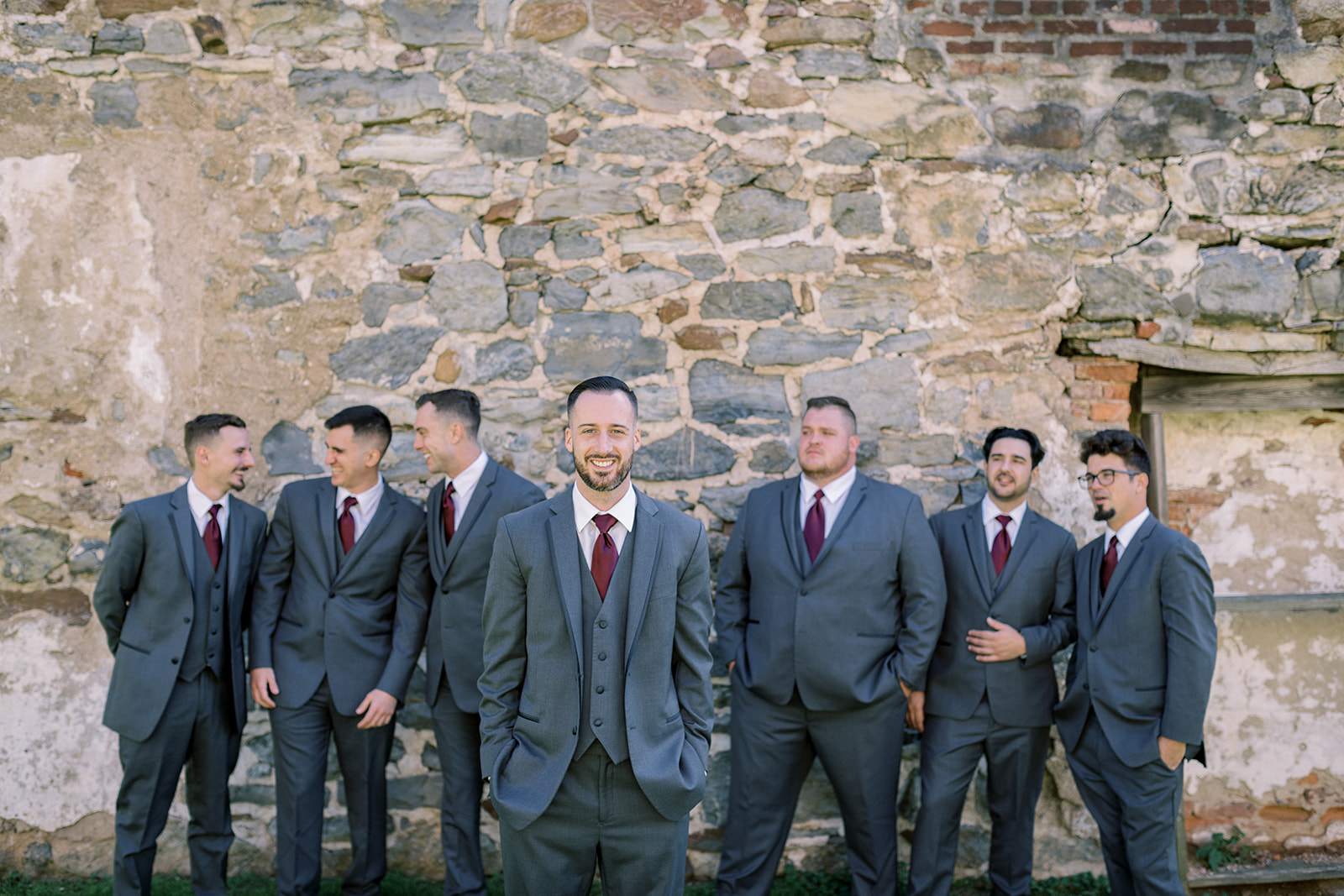 Pennsylvania wedding photographer captures groom standing with groomsmen