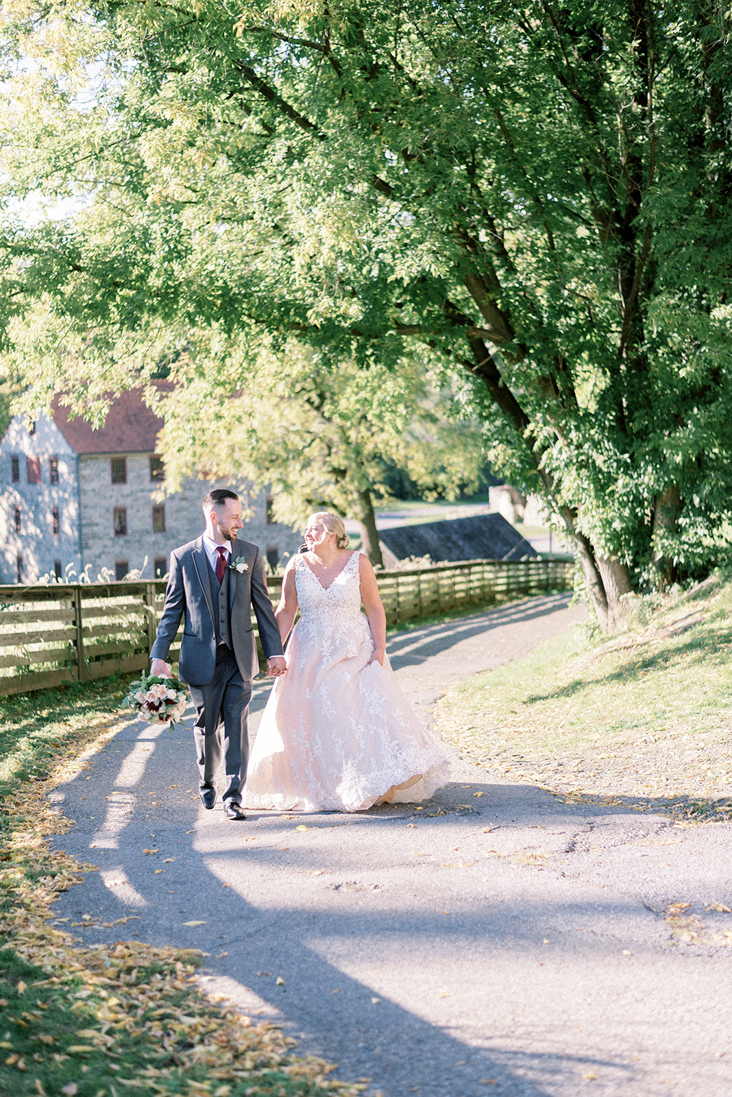 Pennsylvania wedding photographer captures couple walking together after wedding ceremony
