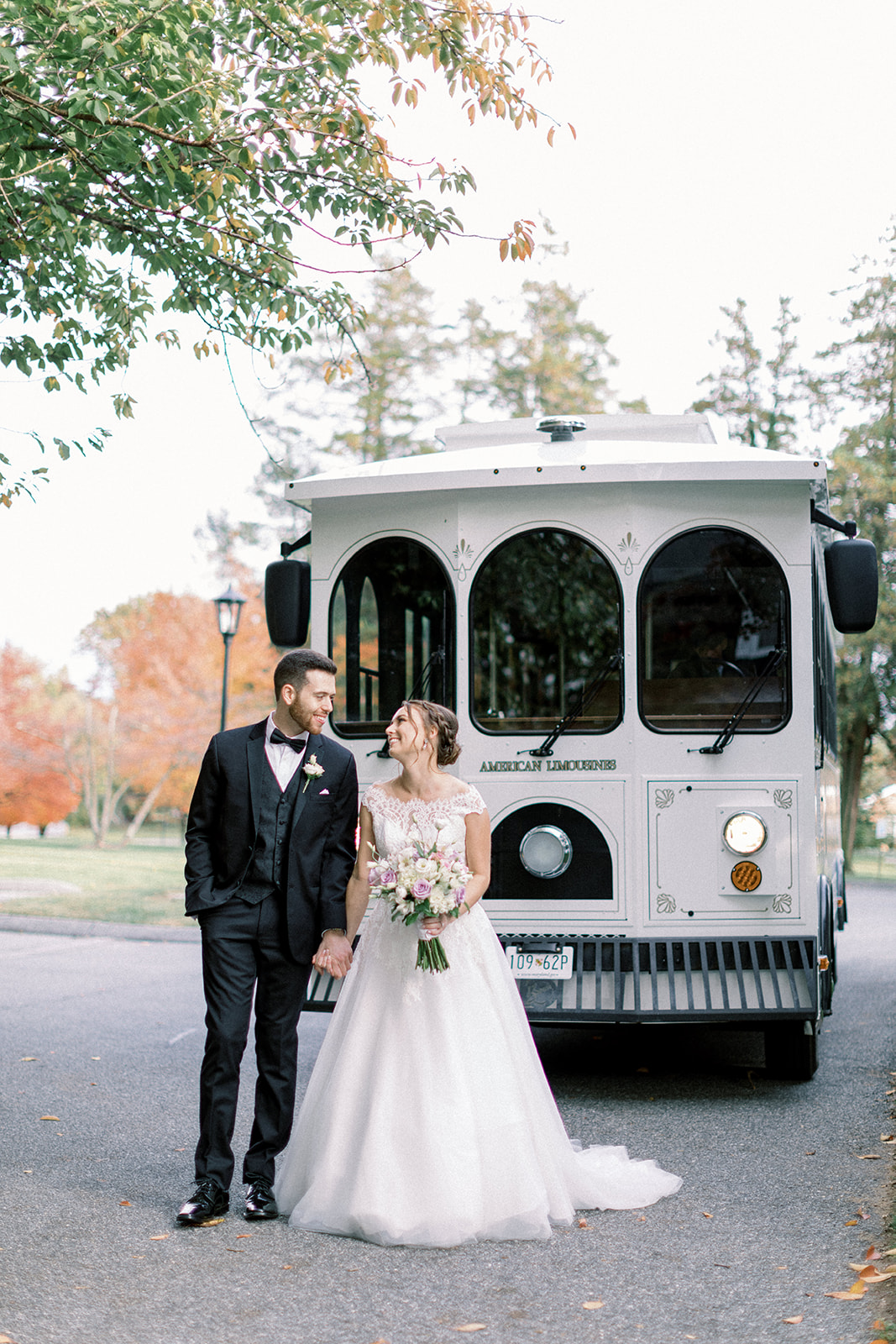 Pennsylvania wedding photographer captures bride and groom in front of bus