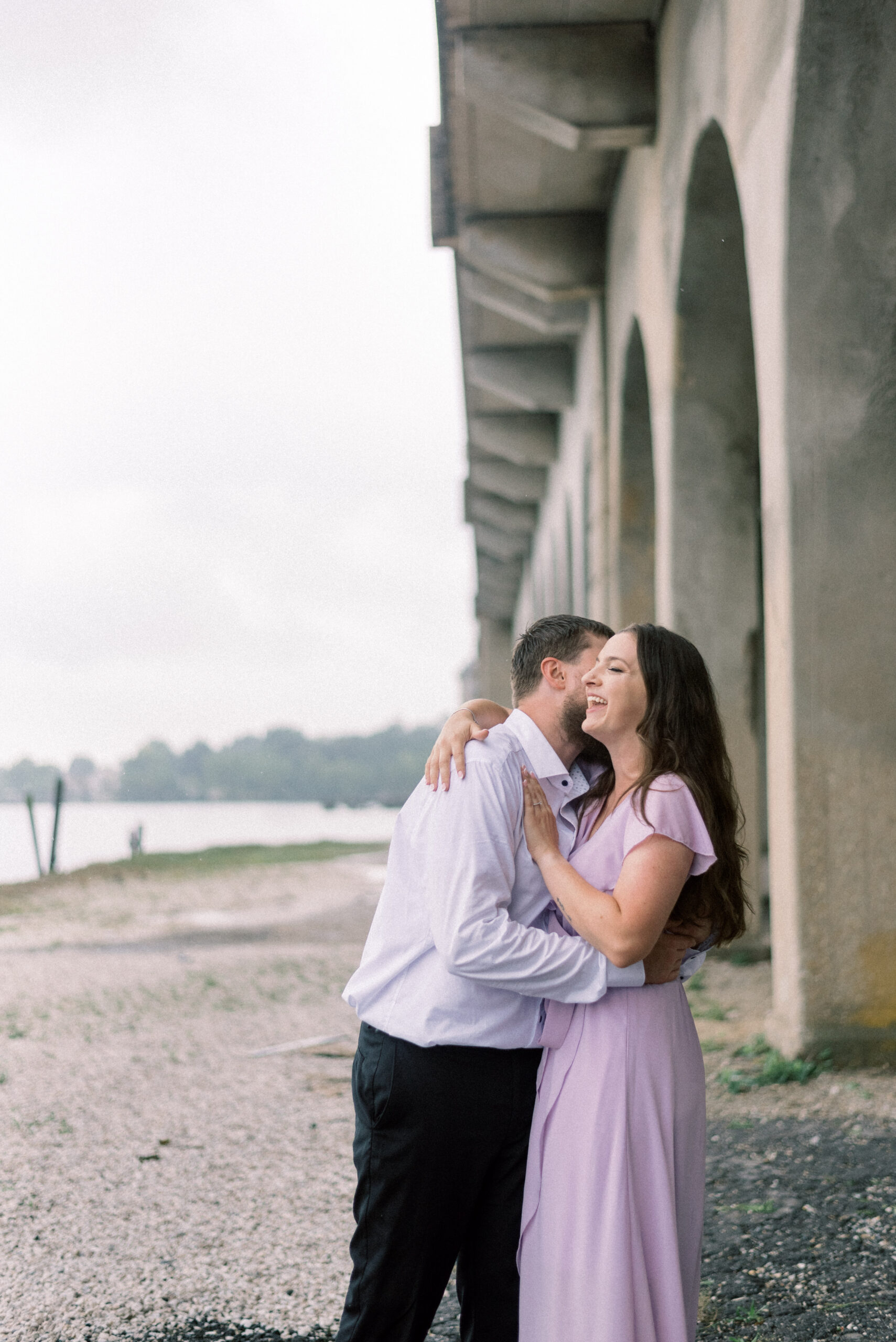 Pennsylvania wedding photographer captures man telling woman a secret and making her laugh