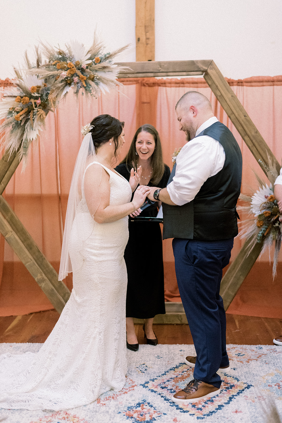 Pennsylvania wedding photographer bride holding groom's hand